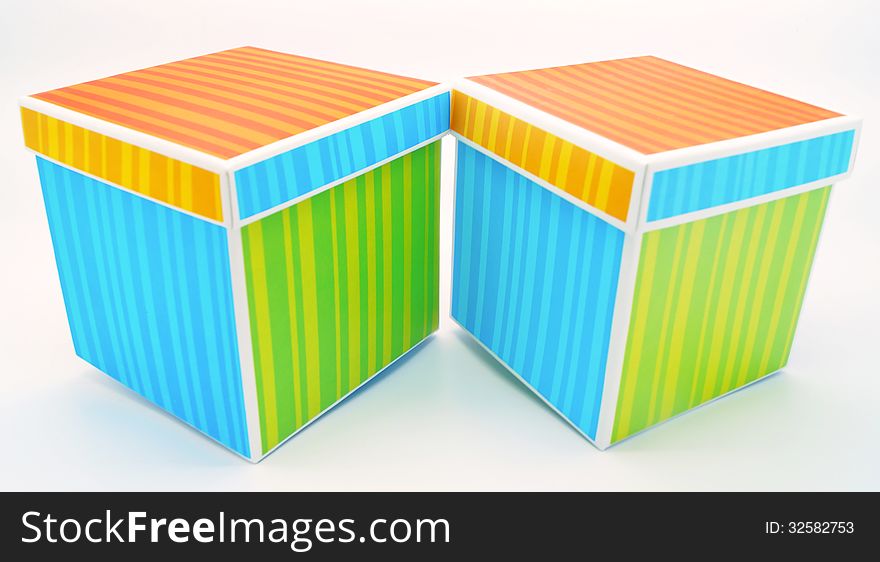 Two colorful gift boxes isolated on white background. Two colorful gift boxes isolated on white background.