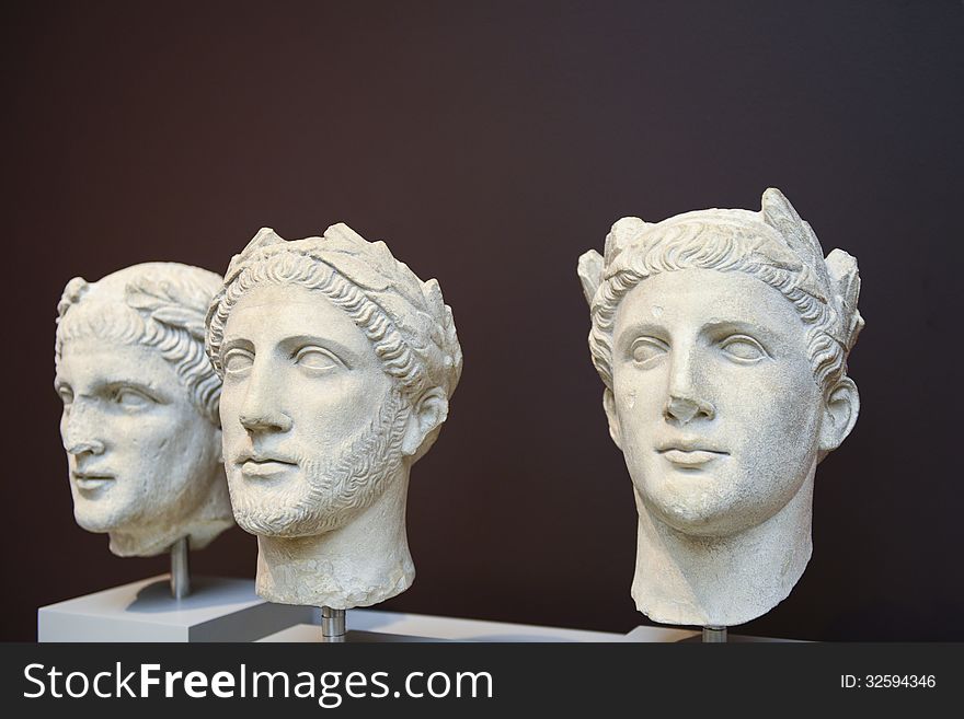 Three Male Heads Sculptures In Classical Greek Style