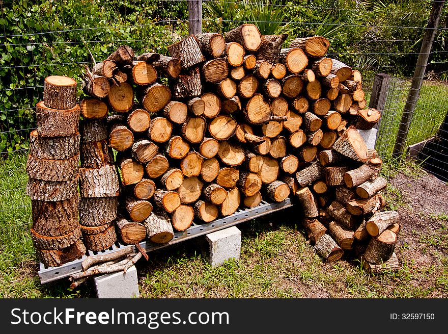 Stacked fire wood waiting to be put in the fireplace.