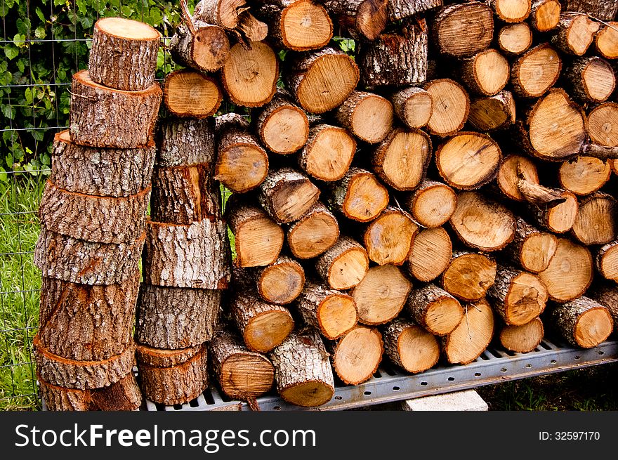 Oak fire wood stacked for the fireplace.