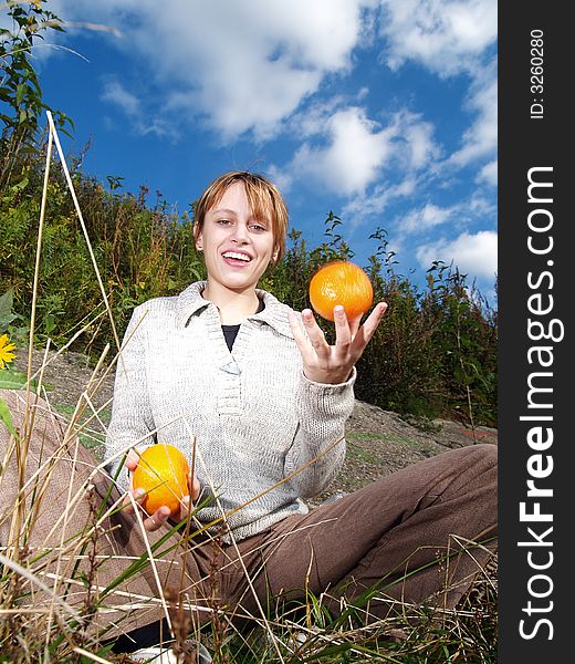 Girl in nature with orange jungling. Girl in nature with orange jungling