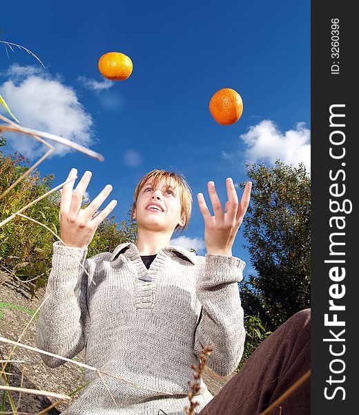 Girl in nature with orange jungling. Girl in nature with orange jungling