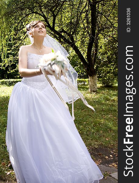 Bride With Bouquet Of Flowers