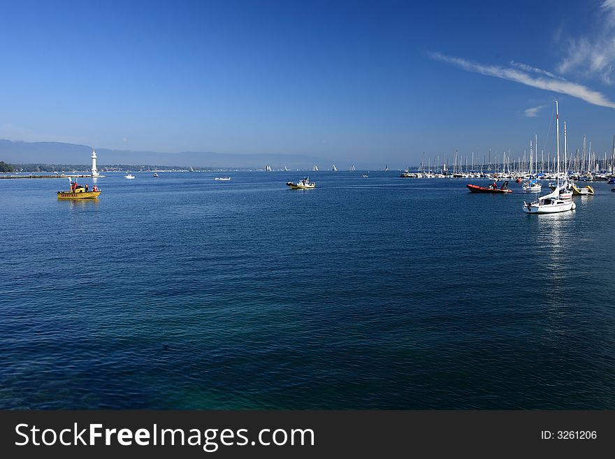 Ships in Leman lack construct a tranquil beautiful natural scenery.