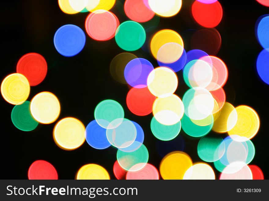 Colorful christmas lights out of focus, may be used as background