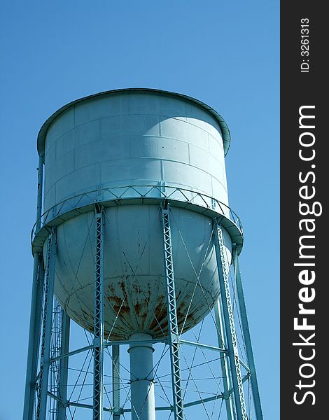 Blue Water Tower against a blue sky