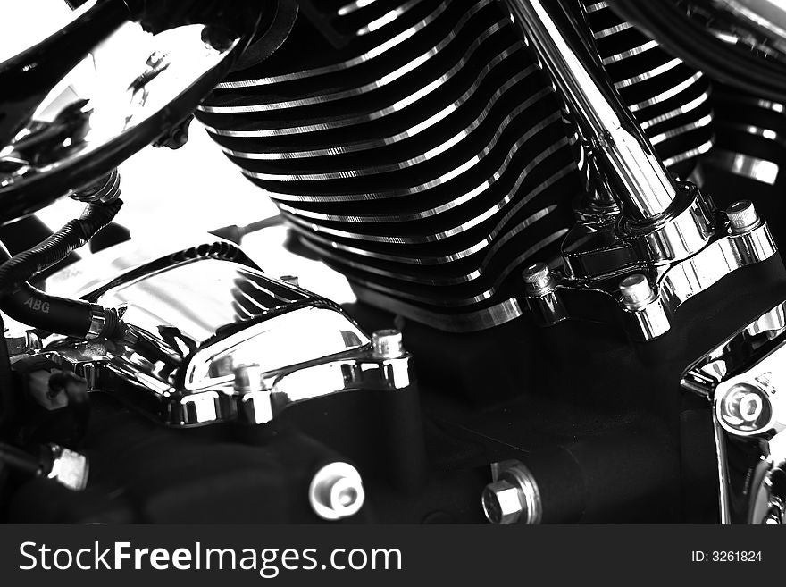 Black and white photo of shiny chrome motorcycle engine parts. Black and white photo of shiny chrome motorcycle engine parts