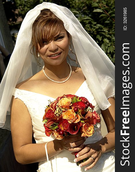 Bride smiling and posing before her wedding