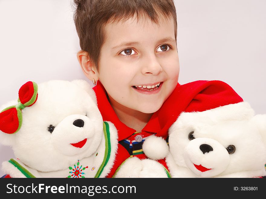 Funny child with christmas bears