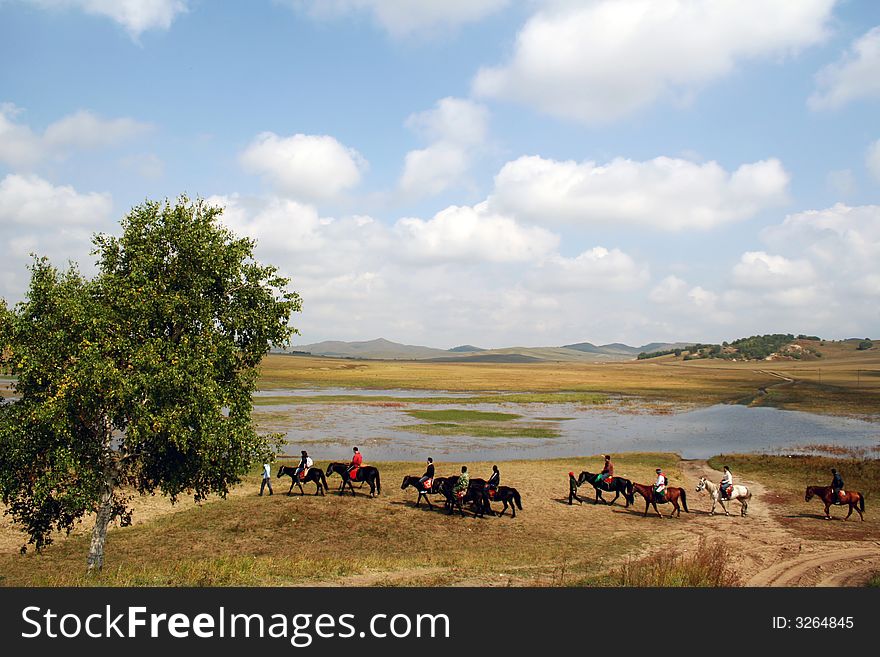 Meadows,lakes and horses at Inner Mongolia,china. autumn is her most beautiful season.