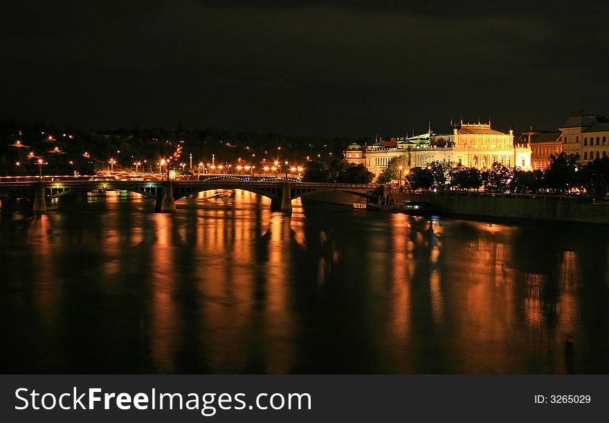 The night view of the beautiful Prague City along the River Vltava