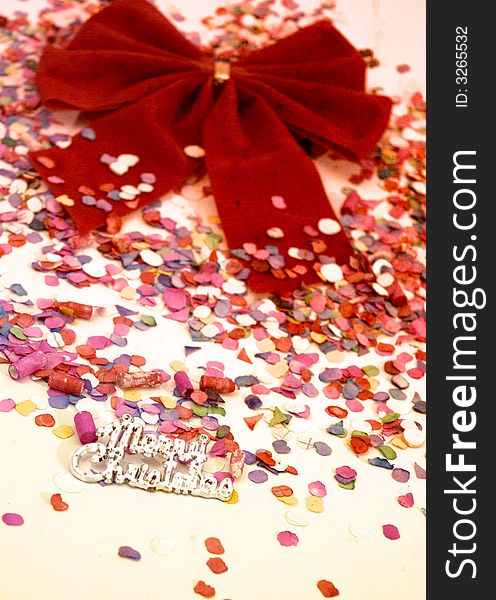 Red christmas bow over sepia background. Red christmas bow over sepia background