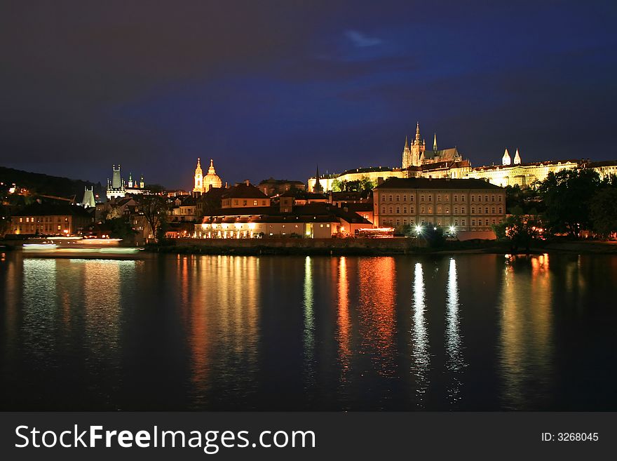 The night view of the beautiful Prague City along the River Vltava