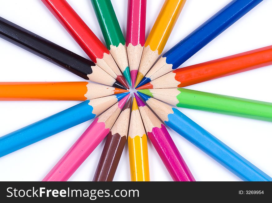 Circle of multicoloured crayons - center