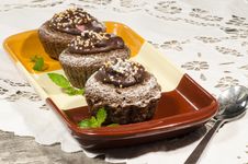 Diet Chocolate Cupcakes On Yeliow Rectangular Plate With Spoon Royalty Free Stock Image