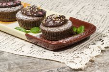 Diet Chocolate Cupcakes On Yeliow Rectangular Plate Royalty Free Stock Photography Diet Chocolate Cupcakes On Yeliow Rectangular Plate Royalty Free Stock Photography