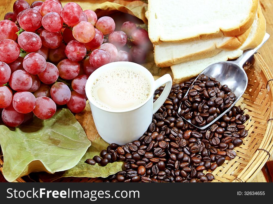 Hot coffee with grapes