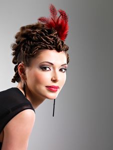 Woman With Fashion Hairstyle With Red Feather In Hairs Stock Photo Woman With Fashion Hairstyle With Red Feather In Hairs Stock Photo