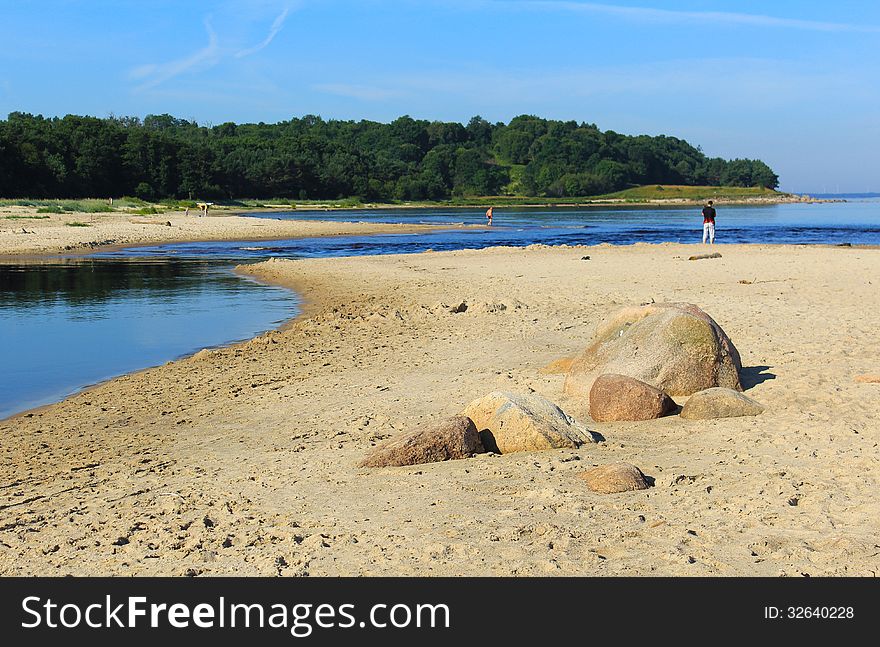 Stones on the sandy coast. Stones on the sandy coast