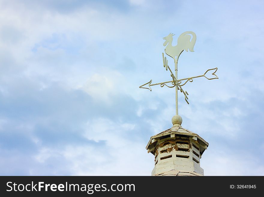 A Wind Vane with a blue sky