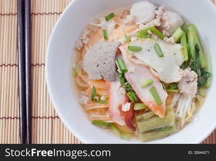 Noodles and meatball with chopsticks , asian noodle