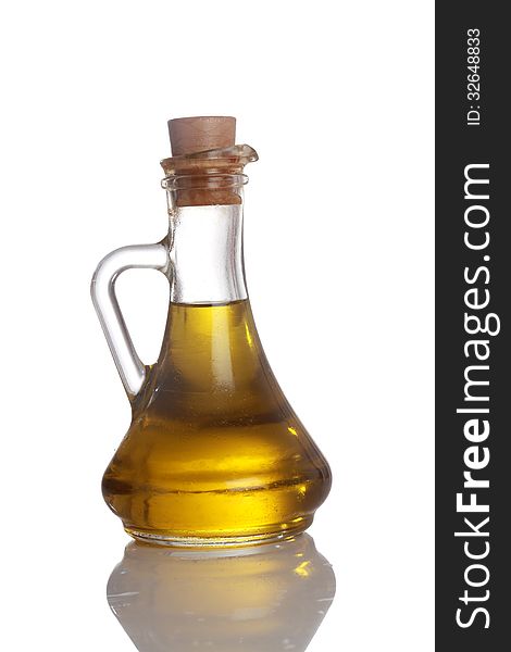 A bottle of olive oil on white bakground