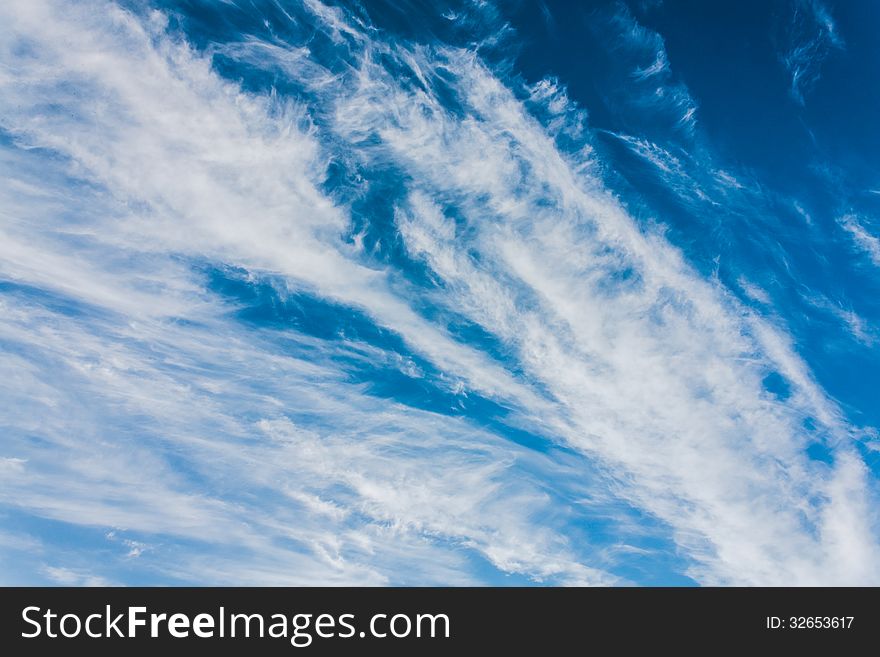 White fluffy clouds in the blue sky