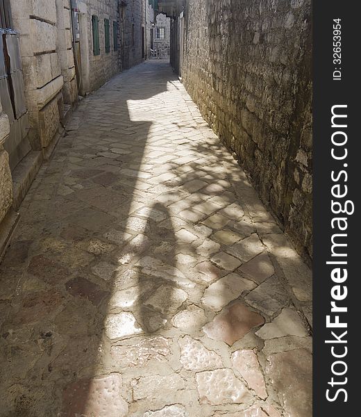 Ancient narrow street in Kotor old city, Montenegro. Ancient narrow street in Kotor old city, Montenegro