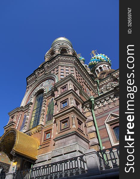 Close view on details of Cathedral Saviour on the Blood in Saint Petersburg, vertical, in clear sky. Close view on details of Cathedral Saviour on the Blood in Saint Petersburg, vertical, in clear sky