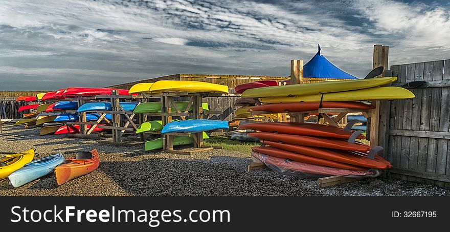 Bunch of colorful kayaks ready for rent. Bunch of colorful kayaks ready for rent