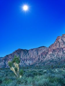 Desert With Red Rock Mountains Early In The Morning With A Brigh Royalty Free Stock Image Desert With Red Rock Mountains Early In The Morning With A Brigh Royalty Free Stock Image