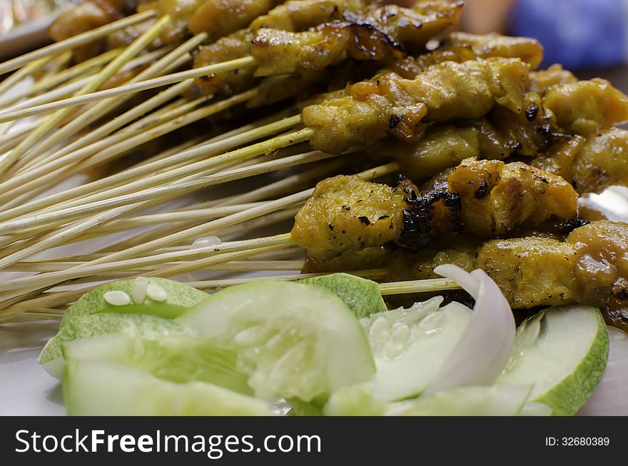 Stick of Chicken Satay with cucumber