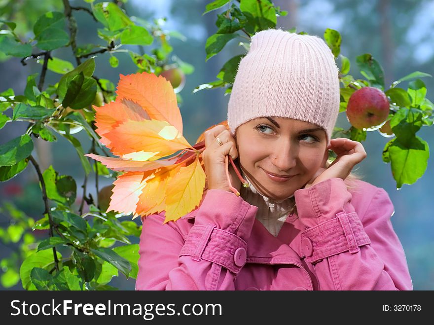 Sexy girl pulls her hat over ears