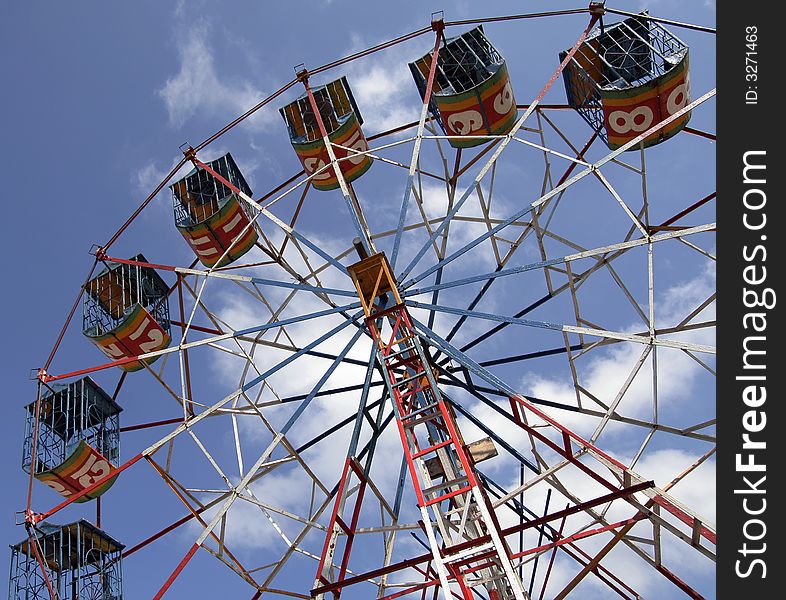 Big ferris wheel blue sky