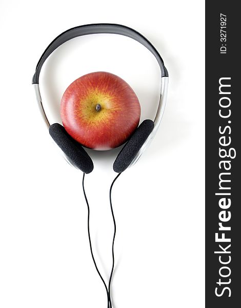 Modern music and red apple. Modern music and red apple
