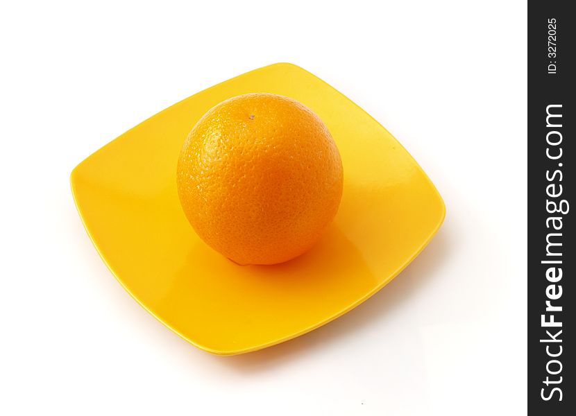 Orange On The Saucer