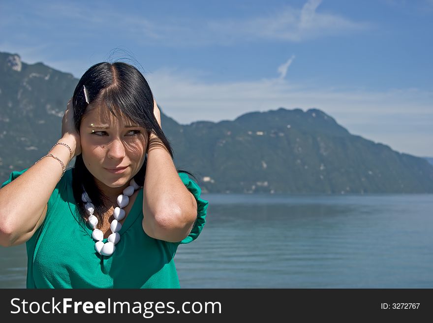 Portrait of a young woman asking for silence