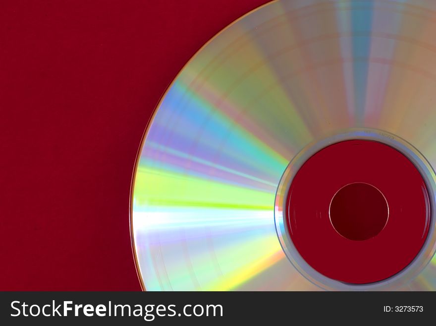 Abstract of compact disc on a red background. Abstract of compact disc on a red background