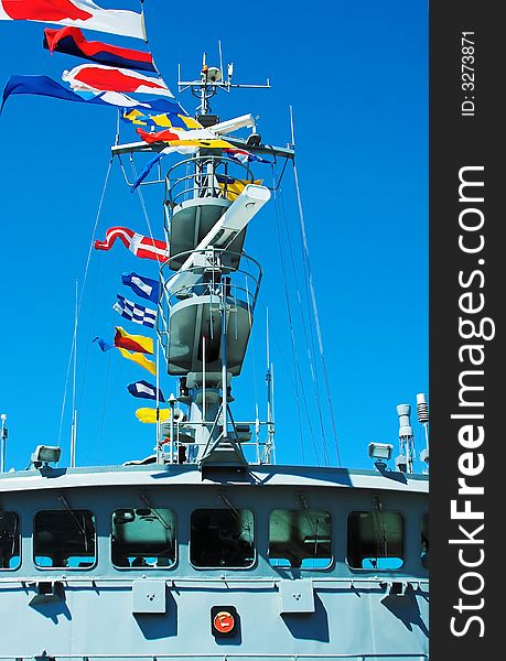 Ship with international signaling flags