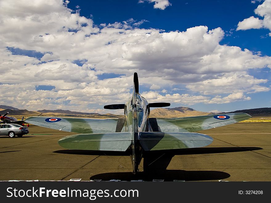 War bird propeller and cloudy blue skies. War bird propeller and cloudy blue skies