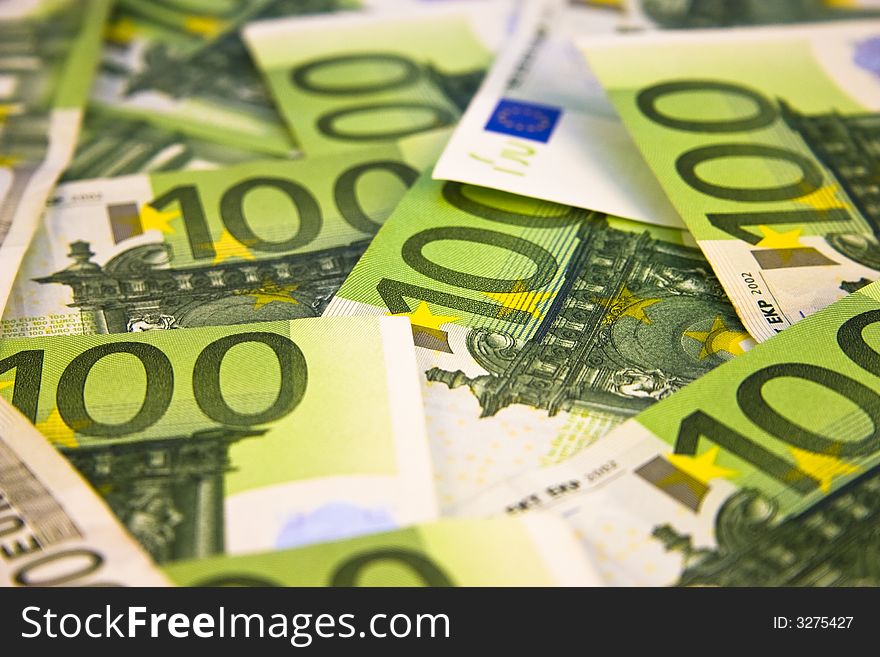 A pile of 100 Euro banknotes. A pile of 100 Euro banknotes