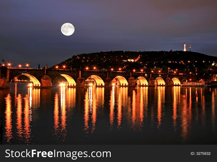 The night view of the beautiful Prague City along the River Vltava. The night view of the beautiful Prague City along the River Vltava