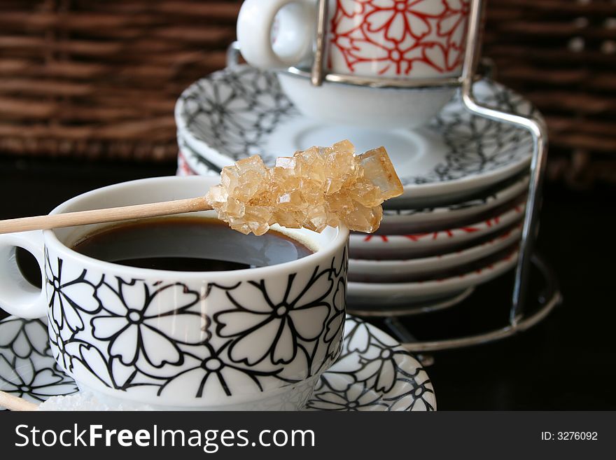 Caramel Sugar crystal resting on a coffee cup