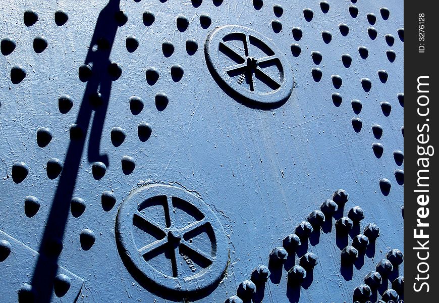 Shot of the side of a bridge structure with rivets and nuts. Shot of the side of a bridge structure with rivets and nuts.