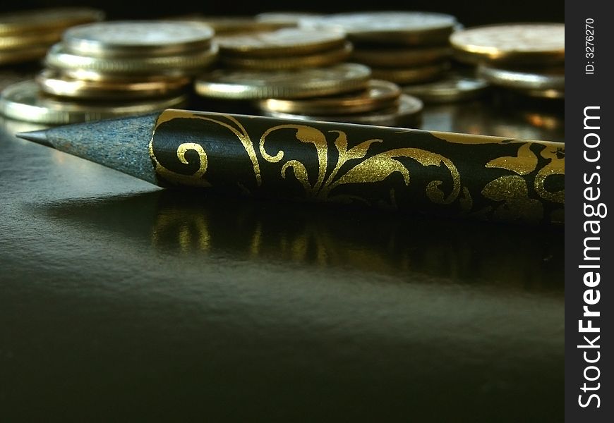 Pencil And Coins