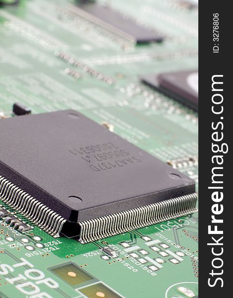 Electronics close-up, focus on microprocessor. Electronics close-up, focus on microprocessor.