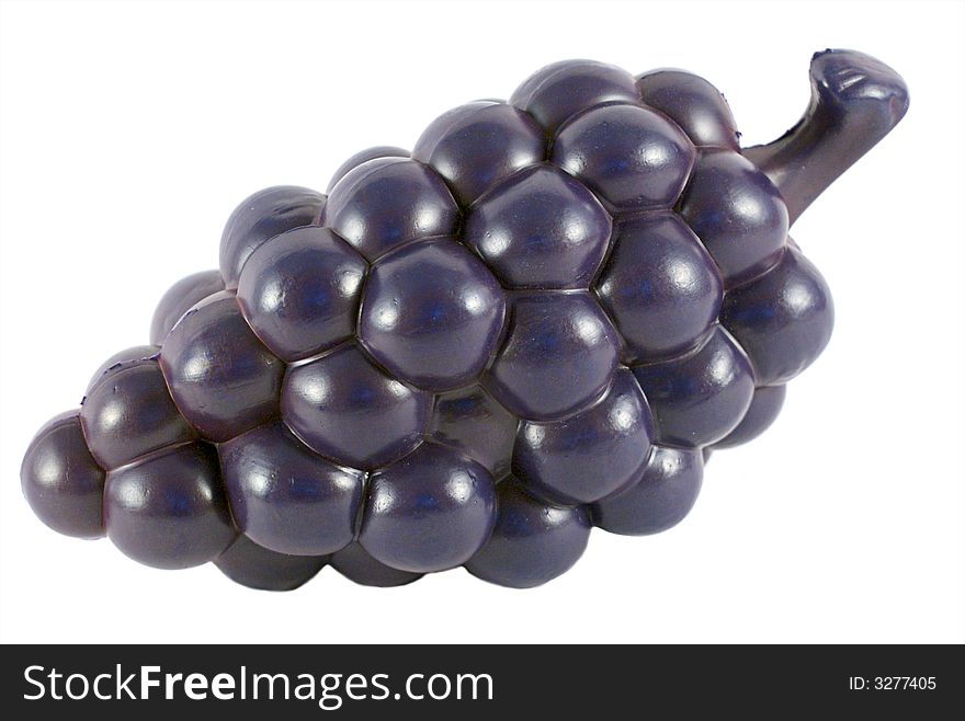 Plastic grapes isolated on white