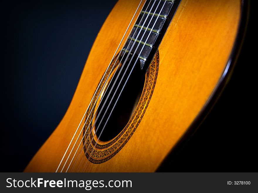 A guitar in detail displays it's beauty beyond it's music. A guitar in detail displays it's beauty beyond it's music