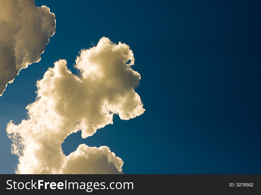 This is photo of a cloudscape in the shape of a puzzle piece and has not been altered in any way. This is photo of a cloudscape in the shape of a puzzle piece and has not been altered in any way.