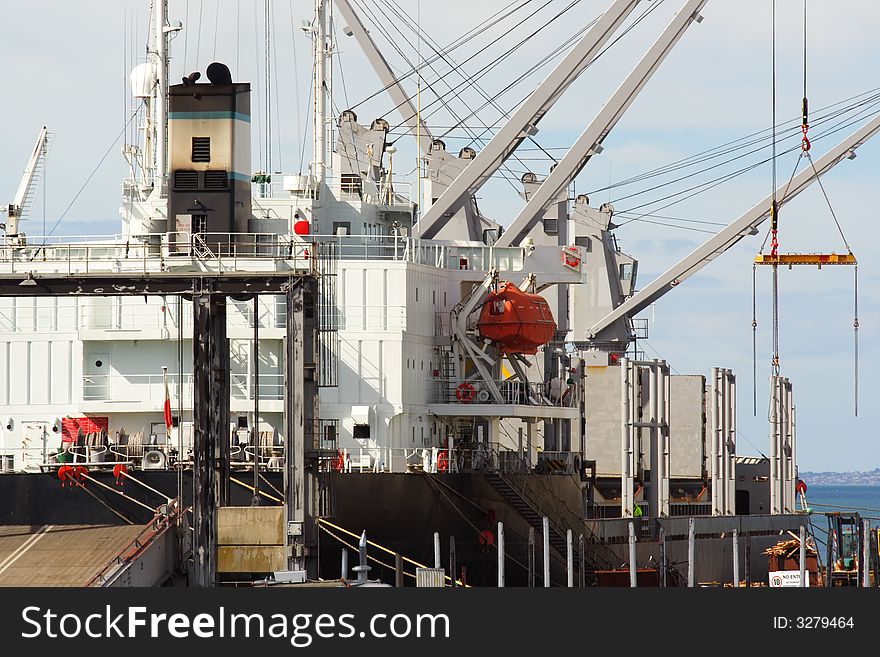 Cargo ship docked at wharf